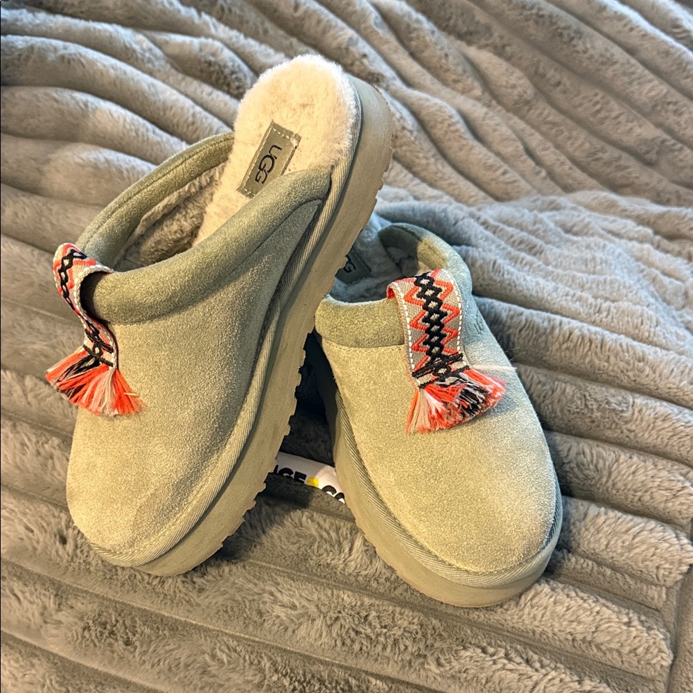 UGG Green Suede Slip-Ons with Red Tassels